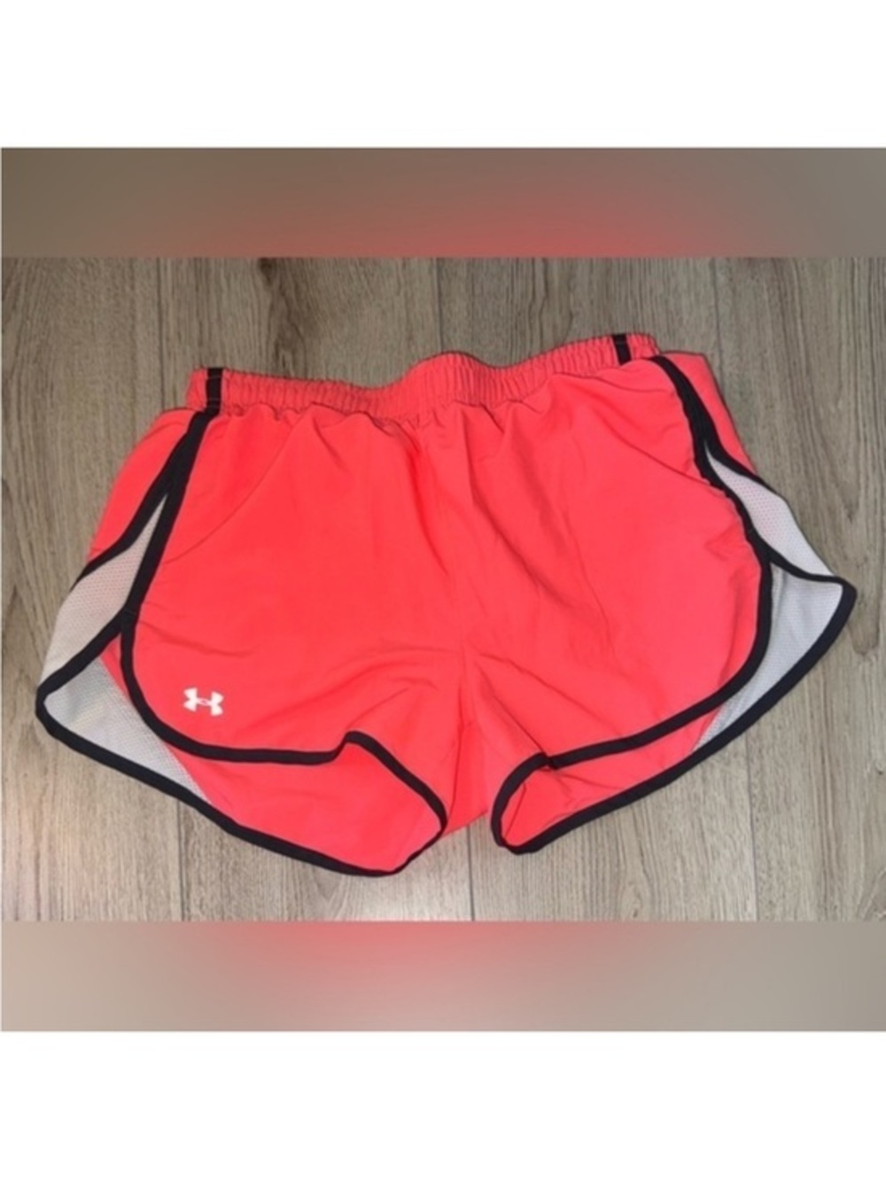 Under Armour Women's pink semi fitted heat gear white shorts